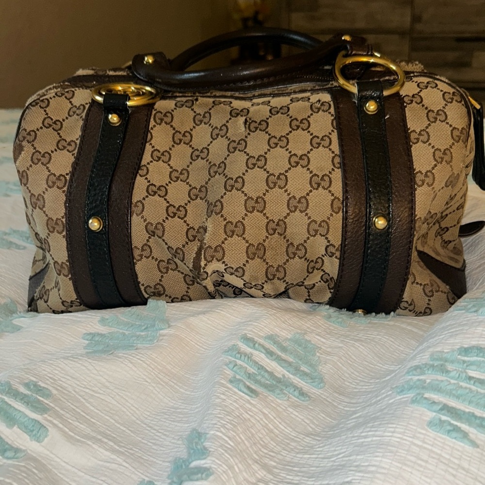 Brown Gucci Bag.